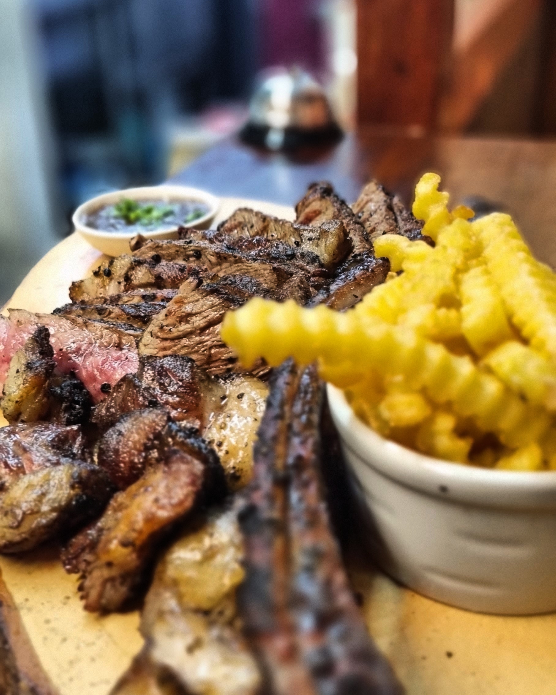 Sliced steak and crinkle fries